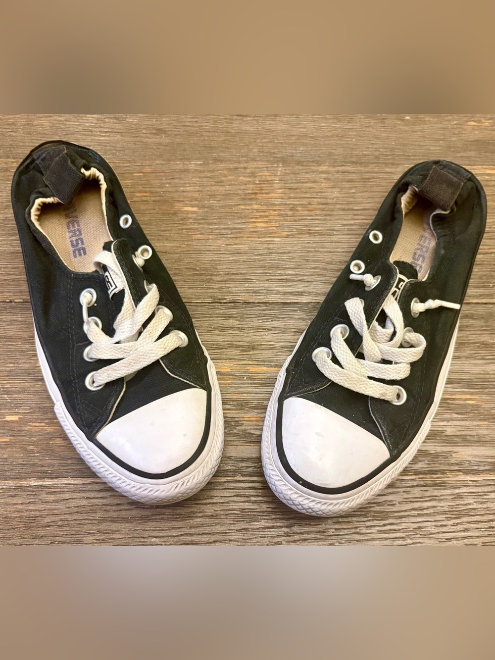 Converse Black Canvas Low Top Slip-on Sneakers with White Accents